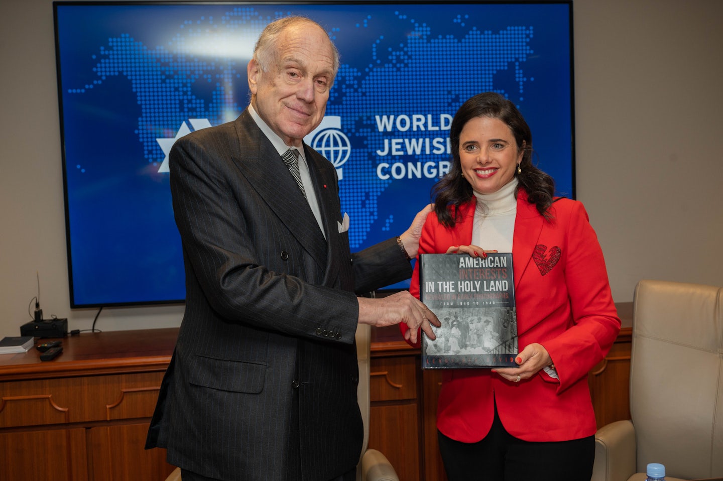 WJC President Ronald S. Lauder presents Israeli Minister of the Interior Ayelet Shaked with American Interests in the Holy Land Revealed in Early Photograph on 15 November 2021. (c) Shahar Azran / WJC