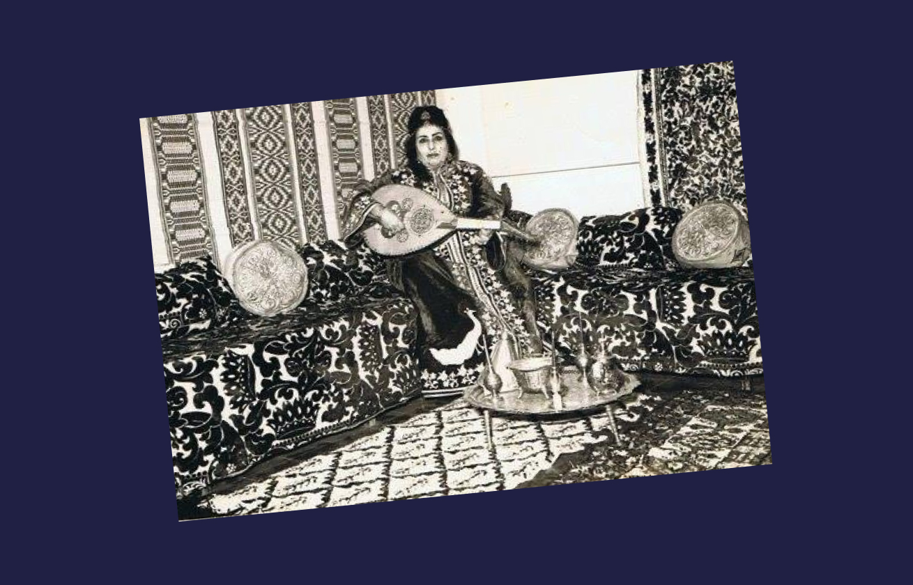 Moroccan musician and singer Zohra El Fassia in a dress gifted to her by King Mohammed V, photo likely taken within the museum exhibit on North Africa in 1965. From Tallia Amos family album, courtesy of Tallia Amos.