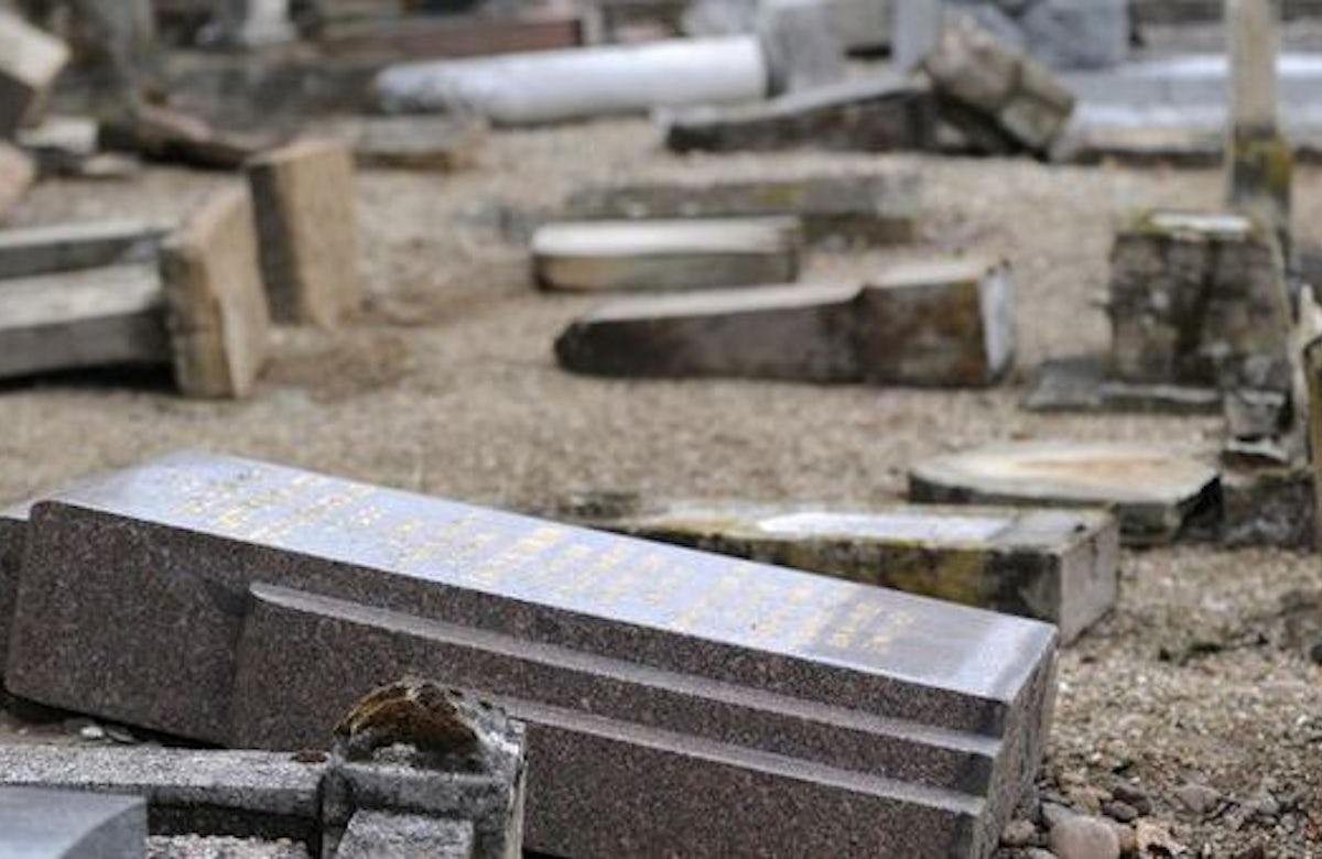Hundreds of tombs vandalized in Jewish graveyard in France