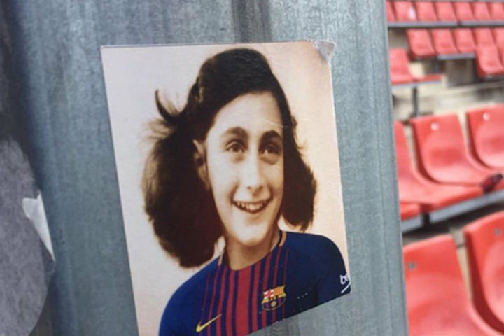 Stickers bearing image of Anne Frank wearing Barcelona football shirts distributed by fans of rival Espanyol team
